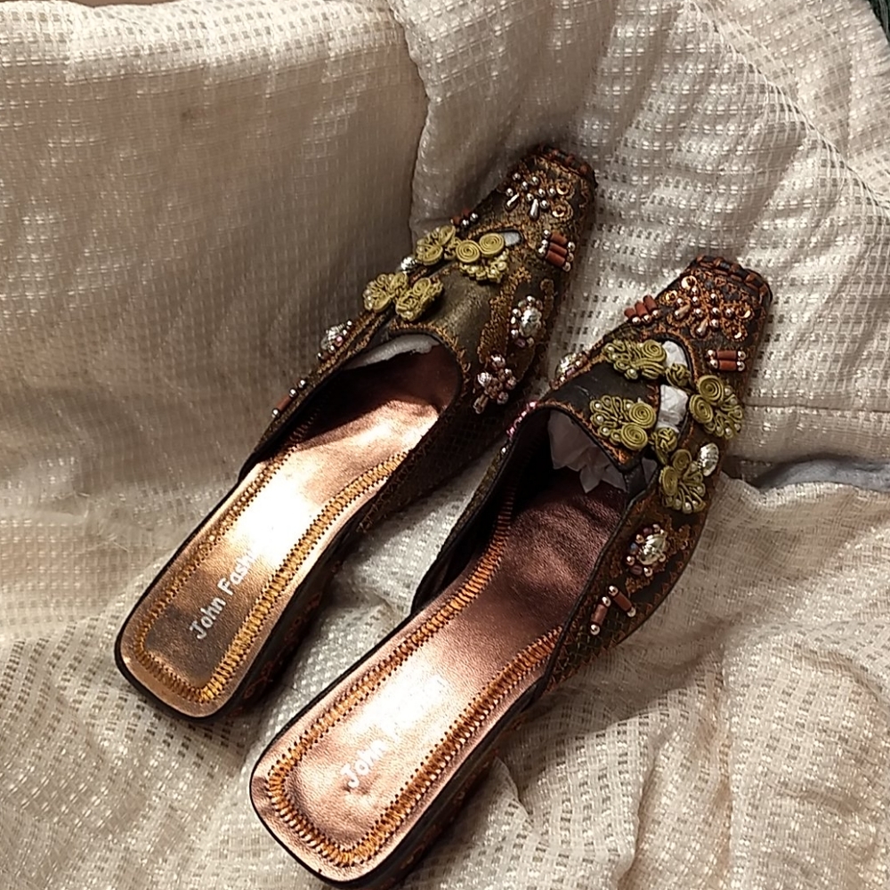 A Pair of John Fashion Mules